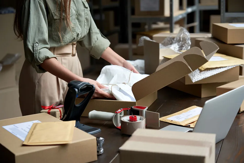 Business Owner packing up packages