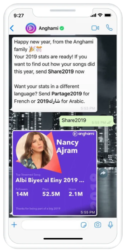 Smartphone displaying WhatsApp conversation between Anghami and customer. Anghami is wishing the customer a Happy New Year and asking if they would like to see their 2019 song stats. Customer opts in and Anghami displays the customer's stats.