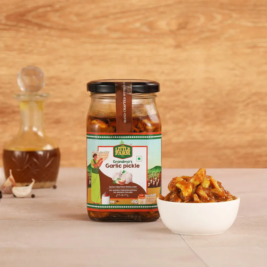 A jar of garlic pickles on a table