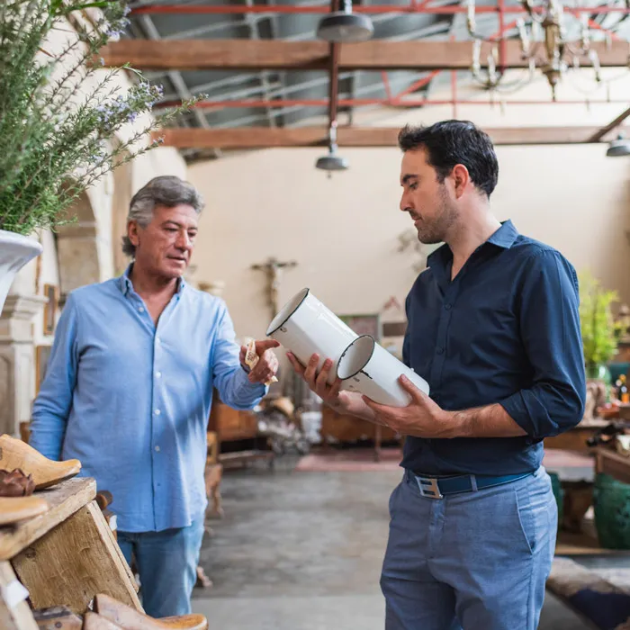 Two men in a store engaged in conversation