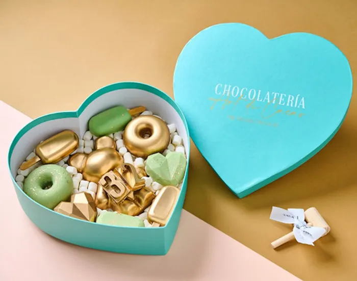 Chocolates in a light blue heart shaped box